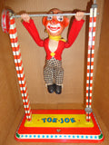 Battery Operated ACROBAT CLOWN 1960s mechanical tin litho & plastic CIRCUS performer